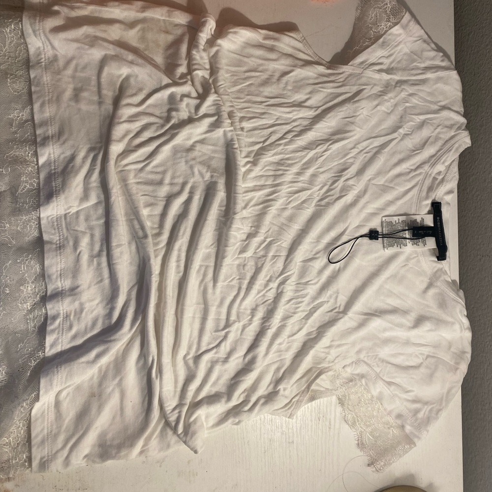 White top, brand: BCBGMAXAZRIA, Color white, size medium.